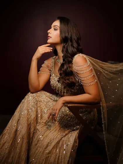 My golden girl. A stunning, editorial-style portrait showcasing a glamorous cocktail look.