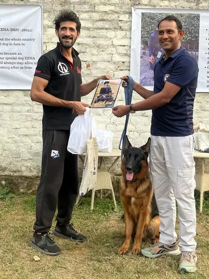 A German Shepherd and his handler at the conclusion of my PSA seminar. We covered obedience, protection, and everything in between.