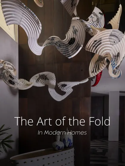 The cover image for our "Art of the Fold" series, this shot captures the intricate beauty of a folded paper installation. Each crease and curve is intentional, creating a form that is both modern and rooted in a centuries-old craft.