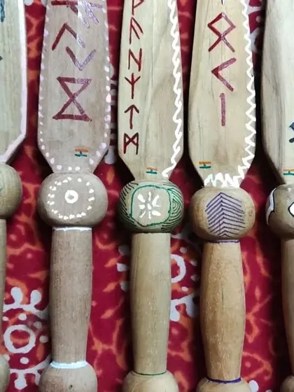 More of our custom blades, featuring unique rune-like designs.