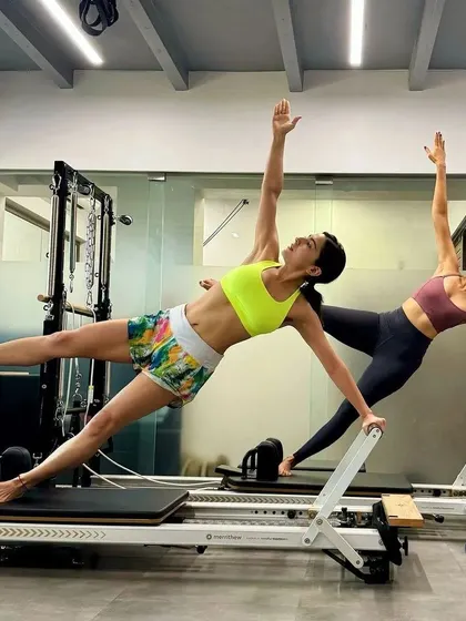 It's always a pleasure to train dedicated individuals like Sara Ali Khan. Here we are, working on the star exercise on the reformer, firing up the core and building that lean, functional strength that Pilates is known for.