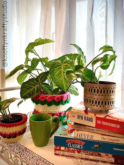 Rains, coffee, and reading nooks. This little scene features some of my smaller crochet baskets, perfect for holding plants and adding a splash of colour to a cozy corner.