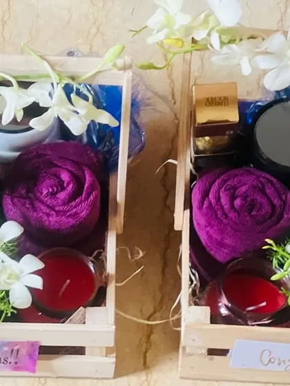 A view of two corporate wedding hampers side-by-side.