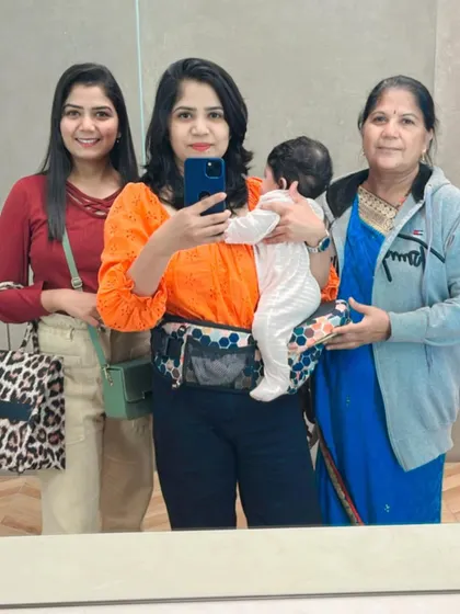A family mirror selfie with my sister, mom, and baby. These are the moments that matter most.