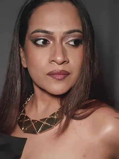 A side profile of my glam look. This angle shows the shimmer on the eyelid and the highlight on the cheekbone.