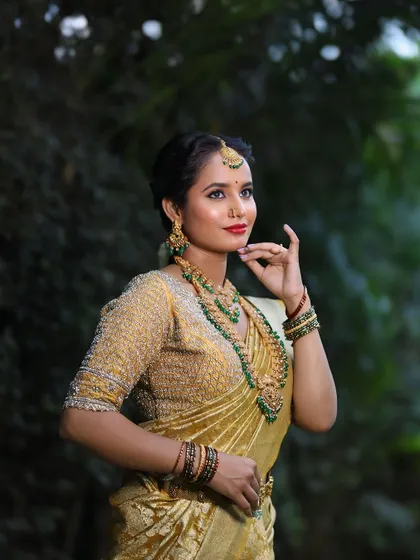 Our layered green bead haram and choker set, designed for the bride who wants a pop of colour. This jewellery is perfect for coordinating with green accents in a wedding saree.