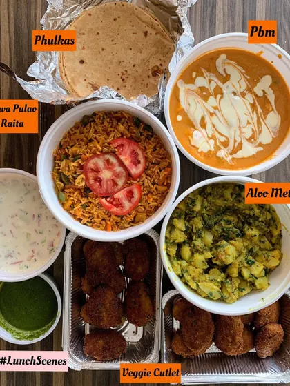 Another look at a hearty lunch spread with a variety of homemade dishes.