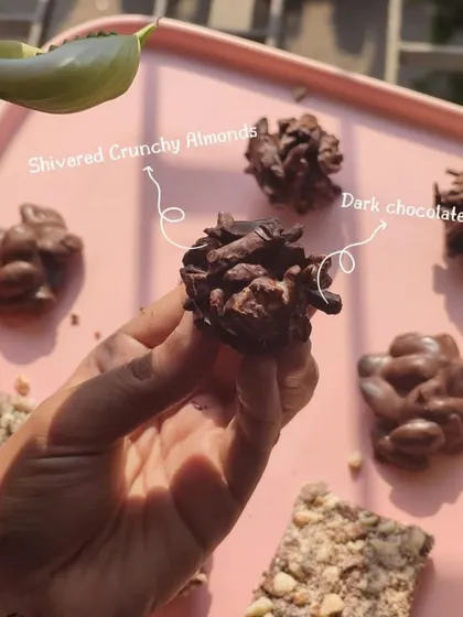 My Almond Rochers are made with slivered crunchy almonds mixed with dark chocolate. They are lighter than the rocks but just as delicious and addictive.