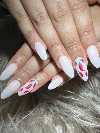 How fun are these? I hand-painted these spicy red chillies on milky white gel extensions for a client who wanted a unique and playful summer look.