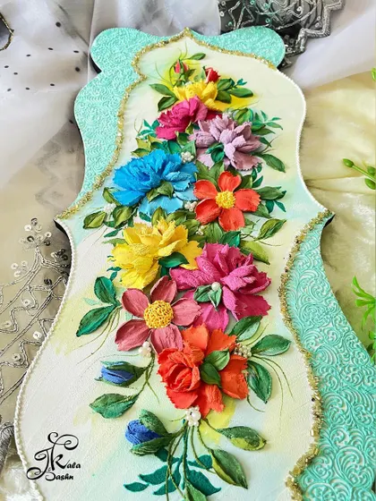 A close-up of the vertical panel, focusing on the texture of the flowers and the glittery gold border.