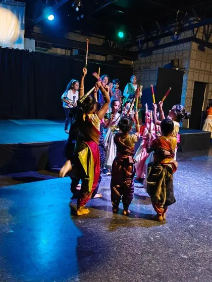 A vibrant folk dance performance by the children from our May summer batch. The stage is alive with color, music, and joyful movement.