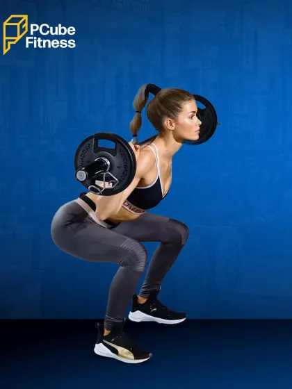 A woman executes a perfect barbell back squat, a fundamental exercise for building lower body strength and power.