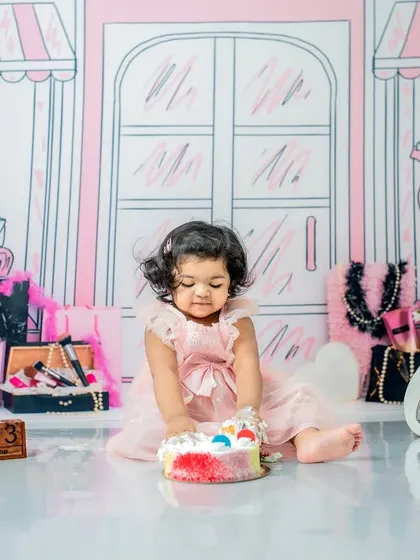 Gently poking the cake is also a classic reaction. I am ready to capture every little interaction your baby has with their first birthday cake.