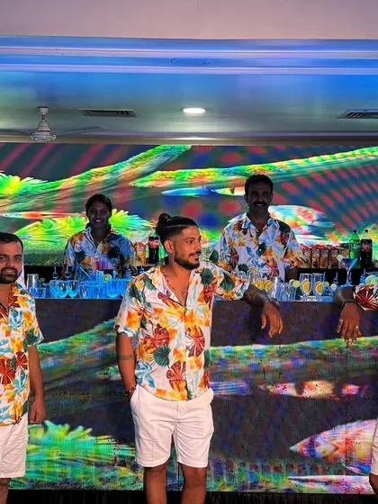 Our team looking cool and relaxed in their tropical shirts for a themed event. We bring the right attitude to get the party started.