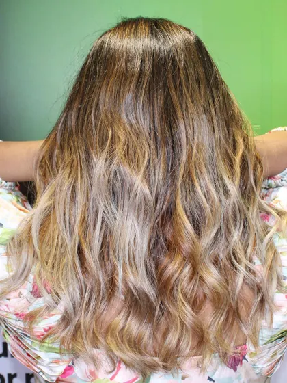 A full view of the wonder blonde hair color, showing the gradient from dark roots to light ends.