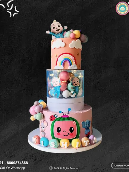 This grand three-tier Cocomelon cake was a joy to create for a special birthday. It features all the beloved characters, a rainbow, and personalized details, showing how I can handle large, intricate designs.