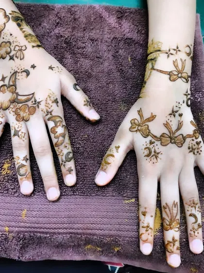 A fun and whimsical design with moons, clouds, and stars, perfect for a playful look.