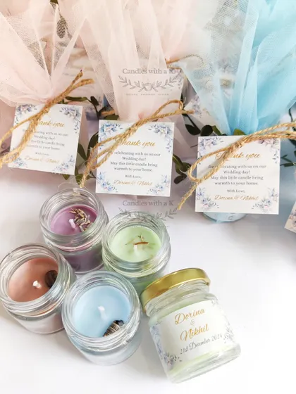 A set of 200 mini jar candles in four different scents and colors, made as wedding return gifts for Nikhil in Mumbai.