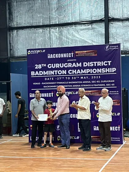 A young athlete from our academy being recognized for his performance at the Gurugram District Championship 2023.