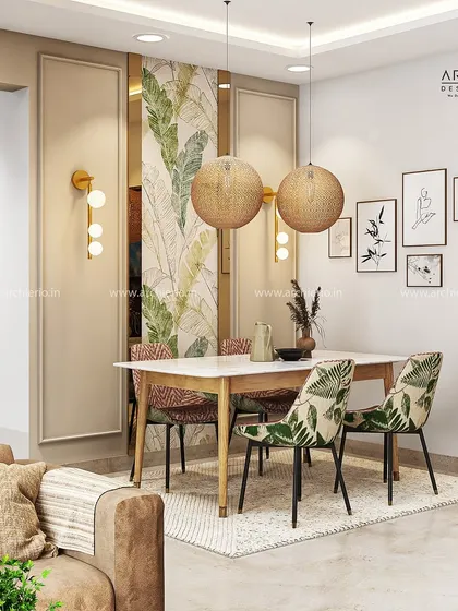 A dining area that exudes bohemian chic with its leaf-print chairs and rattan pendant lights. The gallery wall adds a personal and artistic touch.