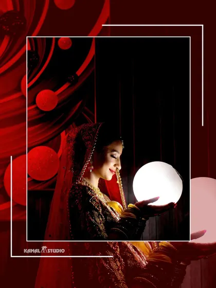 An artistic portrait of the bride holding a glowing orb, creating a magical and ethereal image.