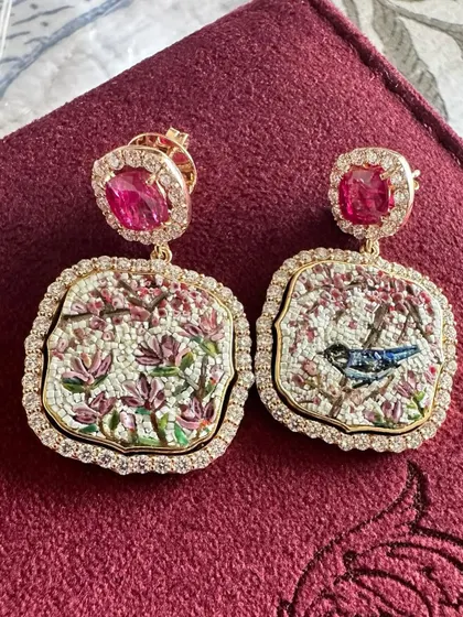 Another look at the cherry blossom micromosaic earrings, showcasing the vibrant colors and the intricate details of the bird and flowers. Each pair is a unique creation.