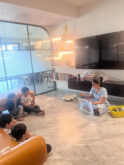 This is unplugged coding. Our little coders are learning about sequencing and looping by building a roller coaster with blocks, all based on a story and without a single screen.