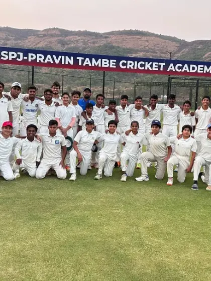 One of our boys' teams posing for a group photo after a match day, showcasing the large squad of dedicated players at our academy.