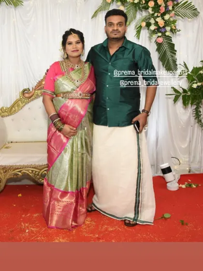The couple posing for a photo, showing her two different looks for the event.