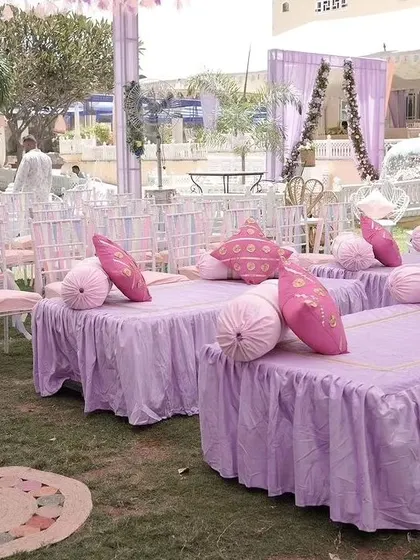 A closer look at the lavender-themed low seating arrangement, perfect for a relaxed and informal wedding function.