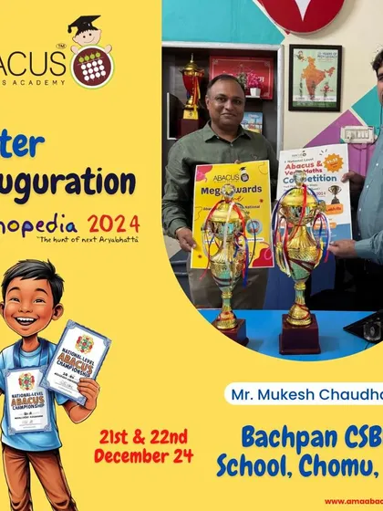 Holding our competition posters with Mr. Mukesh Chaudhary of Bachpan CSBR School, Chomu. We collaborate closely with our partners for promotion.