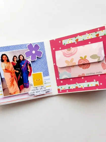 This page includes a floral envelope for a hidden note and a "You're on to your next chapter" sticker.