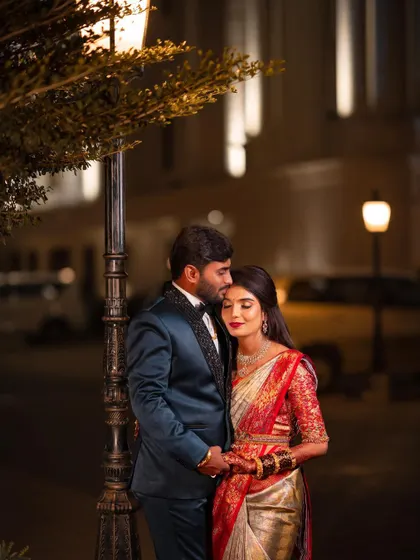 A romantic evening shot of the couple. The makeup I designed for her was meant to look beautiful in all lighting conditions, from bright lights to this moody, romantic setting.