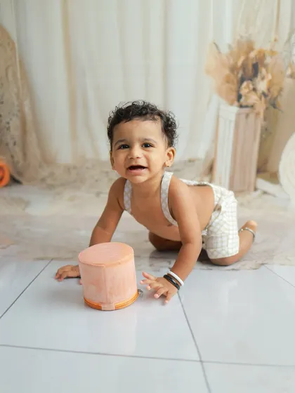 A crawling shot from the same session. Capturing these action moments is a great way to remember this active and exploratory stage.