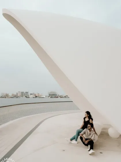 A creative composition using the sweeping white architectural lines to create a minimalist and impactful photo.