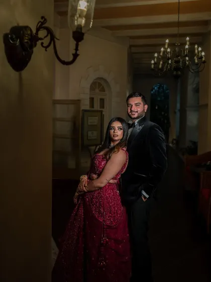A stunning reception look at the Taj Westend. We use dramatic lighting and elegant backdrops to create sophisticated and timeless portraits for your evening events.