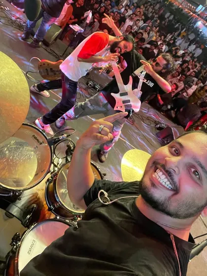 A selfie from the drumkit! This is the best seat in the house, watching the band and the massive crowd for Ernst & Young going wild in Pune.