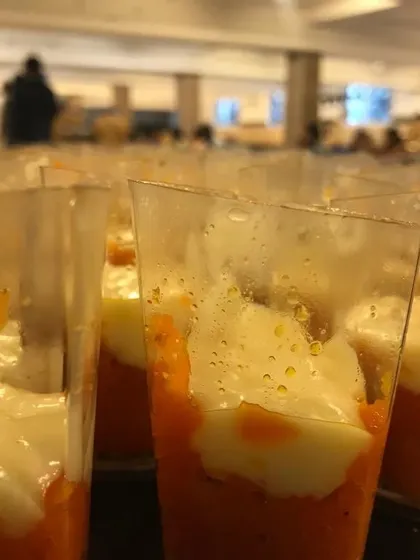 For those who enjoy modern desserts, I offer options like this layered mousse served in individual cups. This is part of my fusion dessert station, which combines Indian and Western sweets to satisfy every palate.