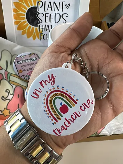 You can get my custom designs made as badges, keychains, or magnets. This "In my teacher era" design is a popular choice for educator gifts.