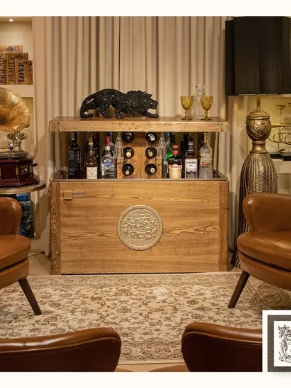 The Treasure Chest is more than just a bar, it's a work of art. This automated hidden bar, crafted from solid wood with a vintage-inspired medallion, uses Swiss technology to conceal a collection of up to 25 bottles and accessories.
