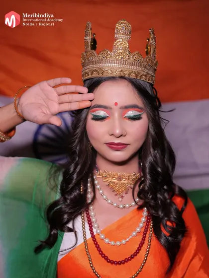 A patriotic-themed look for Independence Day, with the hair styled in soft curls and topped with a crown.