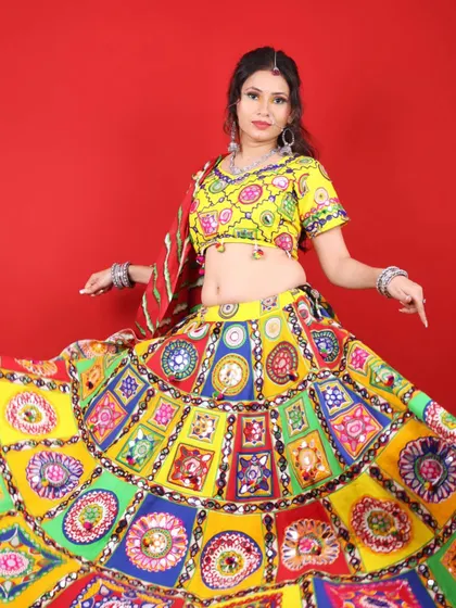 Twirling into the Navratri celebrations. This full-length shot shows how the makeup and outfit come together for a perfect Garba night look.
