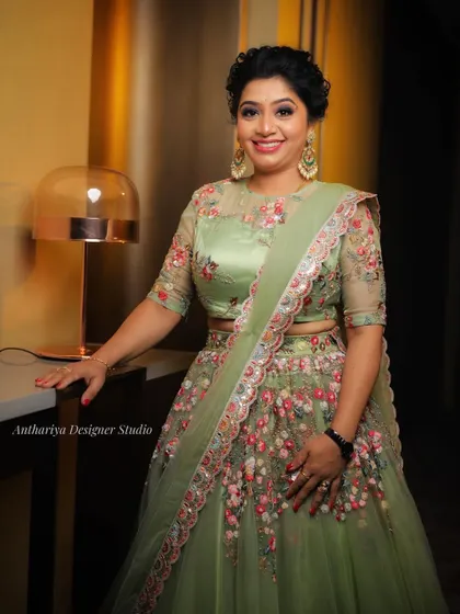 An identical shot to image 82, showcasing the happy client and the detailed outfit.