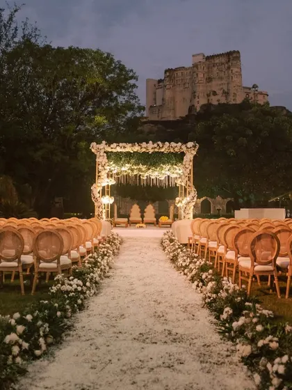 A stunning evening ceremony with a castle in the background, showcasing our ability to work with magnificent venues.