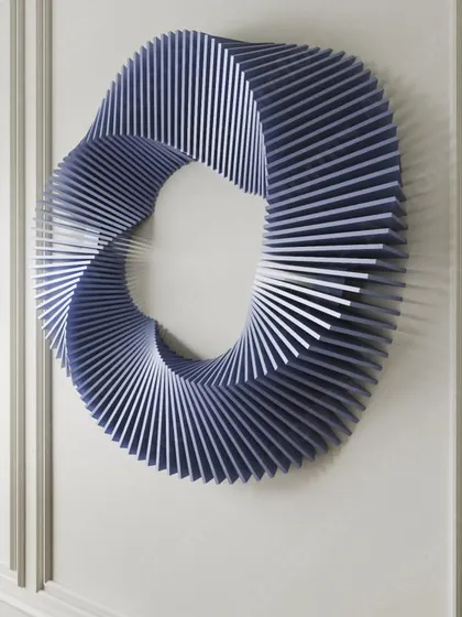 A close-up, angled view of the blue wavy sculpture. You can clearly see the twisting motion and the way each slat is precisely placed to create the flowing shape.