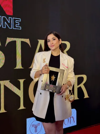 Holding the DCN Star Influencer award. Moments like these are a wonderful reminder that I chose the right path, one that allows me to help people feel beautiful and confident every single day.