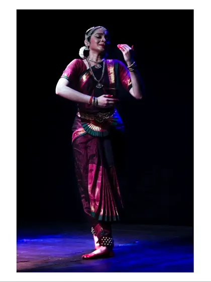 A full-length portrait from a performance in Mangaluru, capturing a moment of grace and poise.