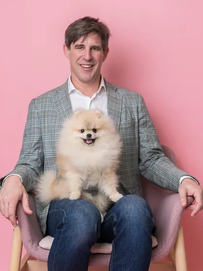 A dapper gentleman and his equally dapper Pomeranian, posing in our pink photo booth. It's always fun to see the whole family get in on the photo fun.