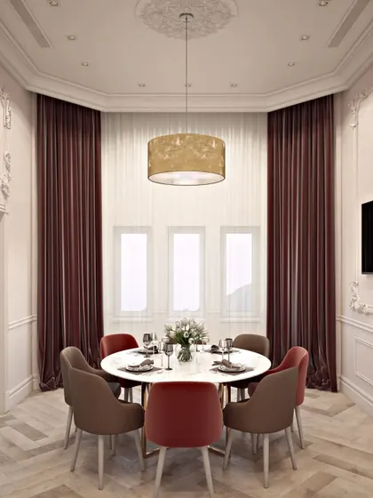 An intimate circular dining area set within a bay window, perfect for family meals.