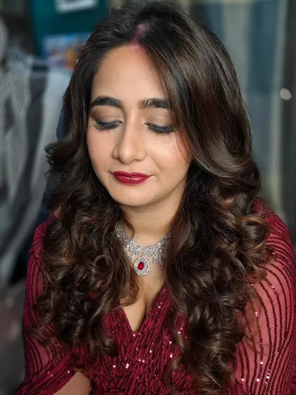 Another shot of her beautiful reception makeup. The eyeshadow is blended to perfection, and her skin is glowing.